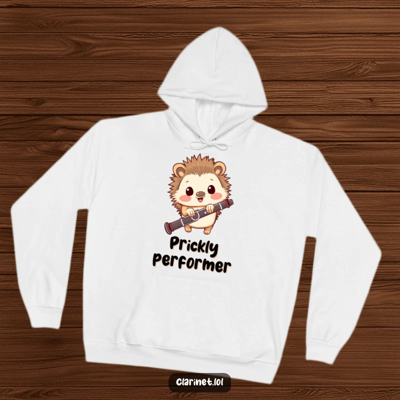 Funny hoodie featuring a happy hedgehog peeking from behind a clarinet, offering cozy comfort and a humorous musical theme.