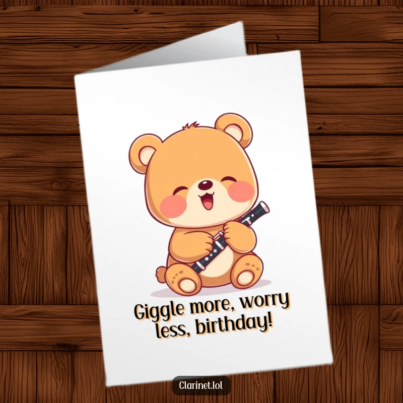 Funny Free Printable Birthday Card: Giggling bear cub joyfully plays a tiny clarinet, spreading musical birthday cheer.